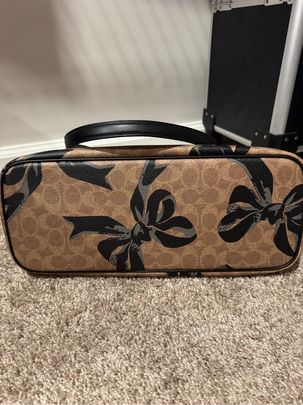 Coach Brown Signature Canvas Tote with Black Bow Print
